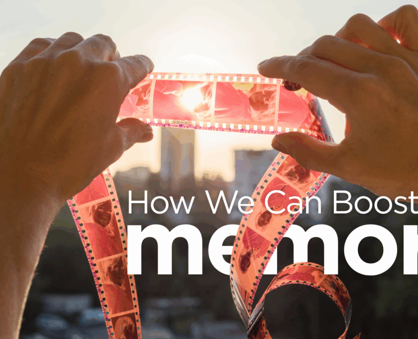 Two white hands hold a photo negative up to the sun to be able to see the negative image. The words "How we can boost our memory" are printed on this image.
