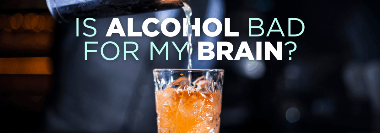 A blurred person in the background pours a metal tumbler of clear alcohol into a small glass of ice and orange-brown liquid. Type on the image says "Is alcohol bad for my brain?"